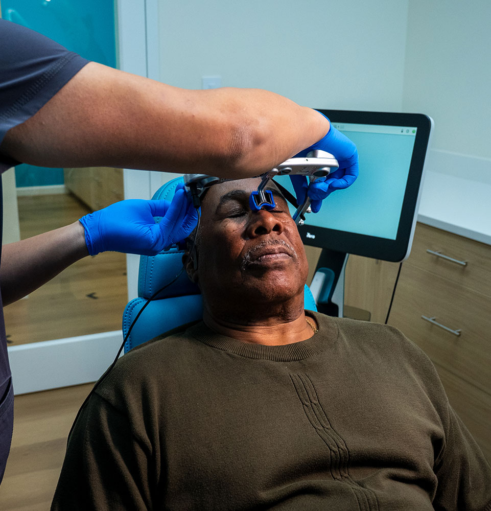 patient undergoing examination for their all on x implant procedure
