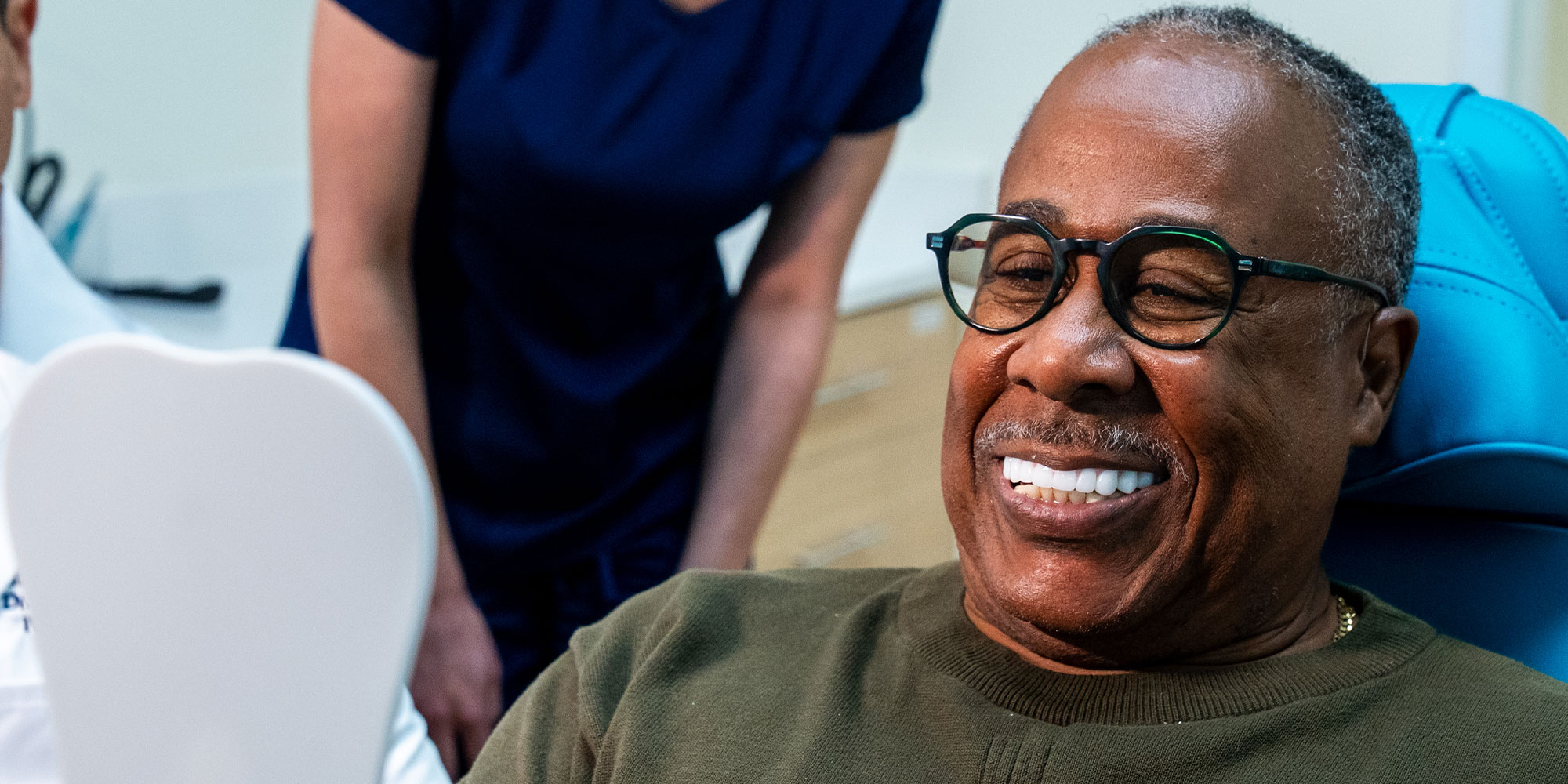 patient smiling brightly their all on x dental implant procedure