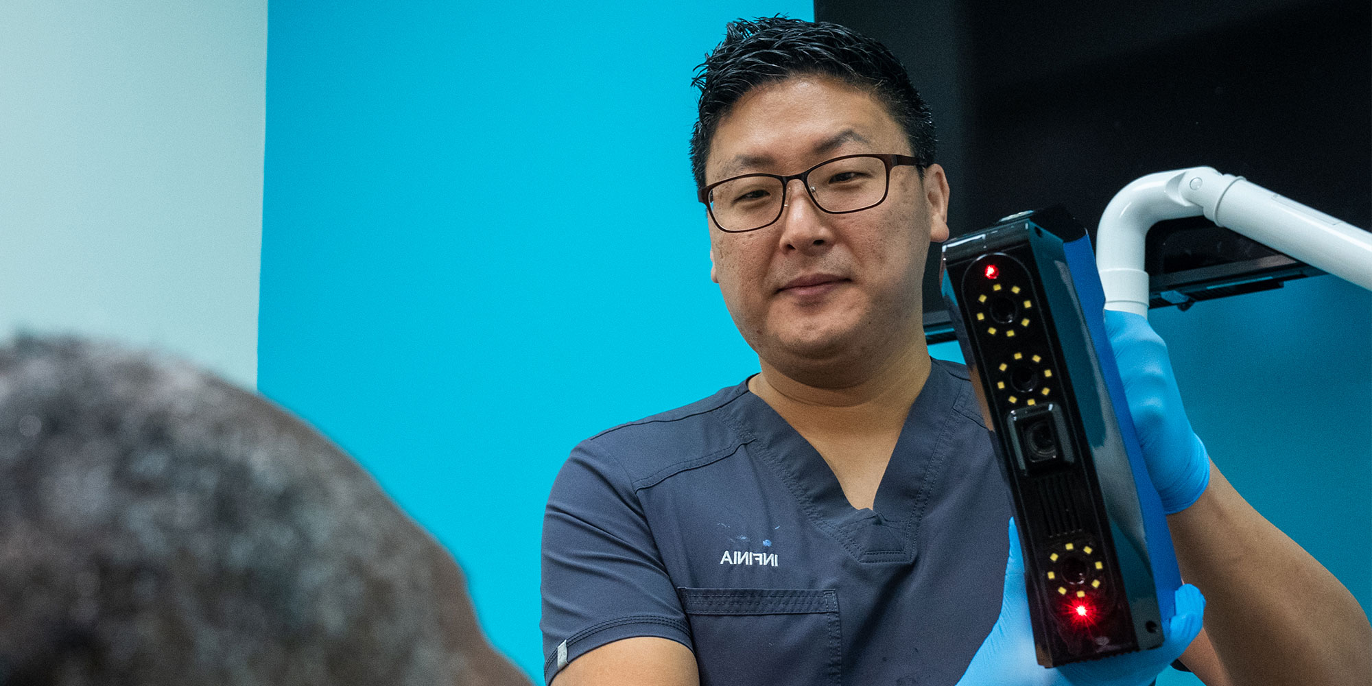 doctor going over procedure examination for patient's treatment