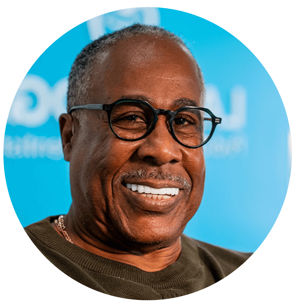 headshot of patient smiling brightly after their dental implant procedure