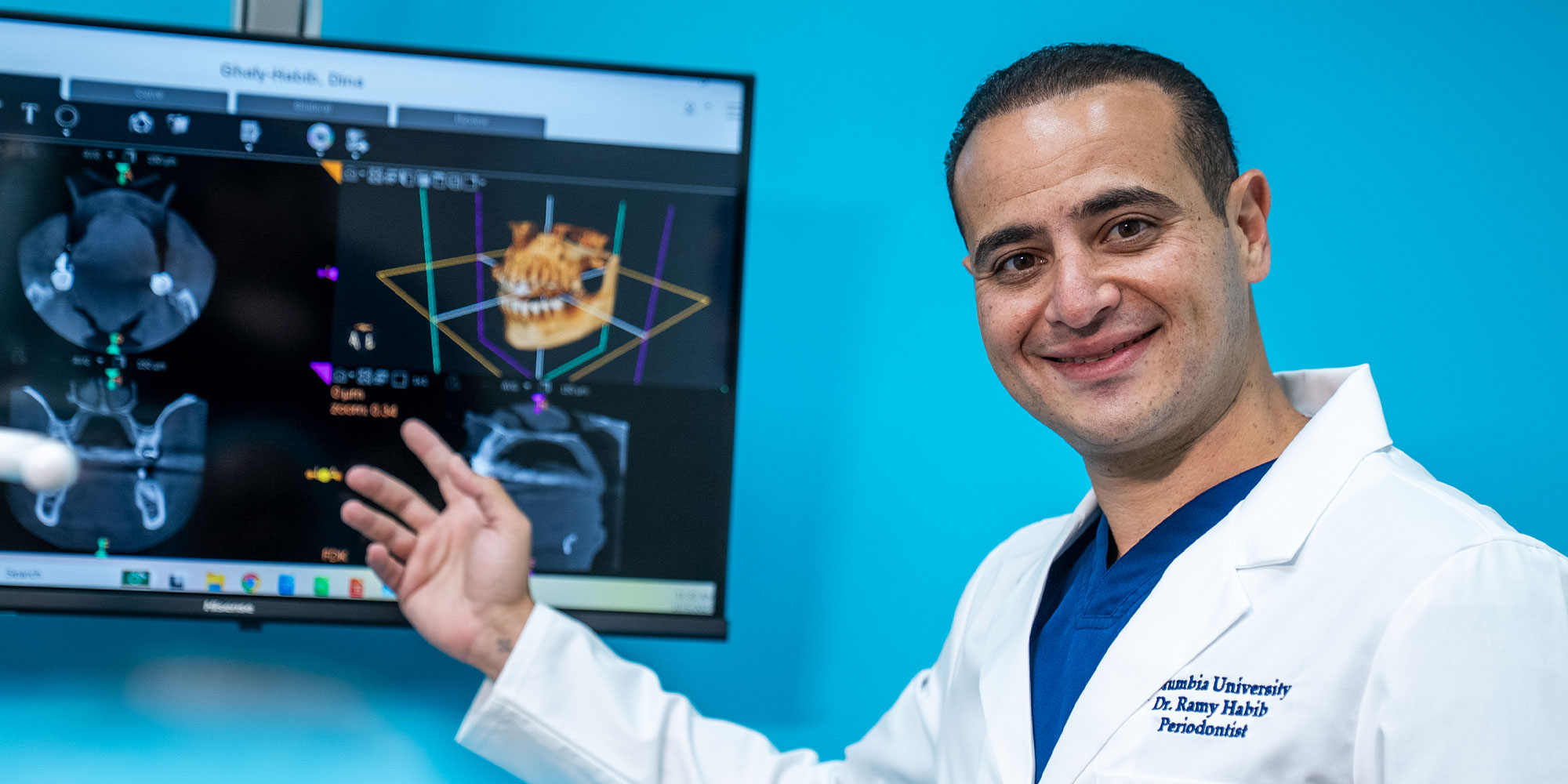 doctor going over dental procedure information with patient inside of the dental center